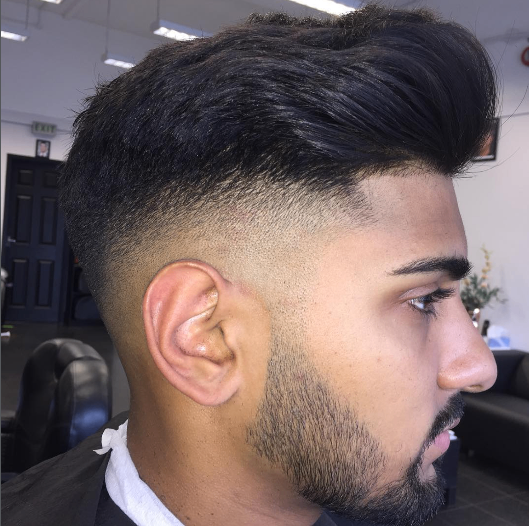 Sharp fade and beard line-up finished at Ozzy's Traditional Barbers